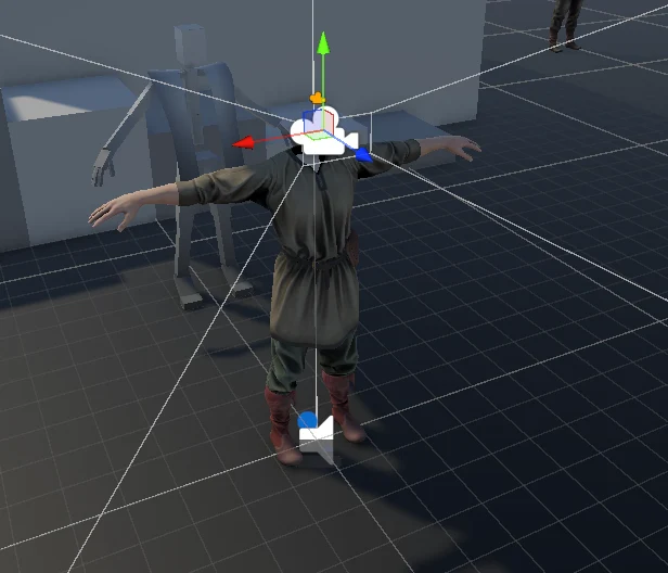 The player model in a T-pose in the editor, with the move handles on it and a grey mannequin behind